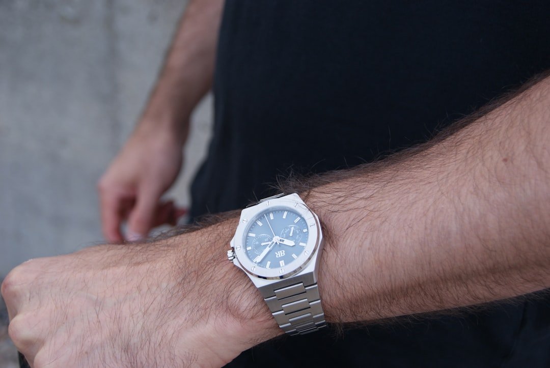 Minimalist watch design with clean lines and simple face